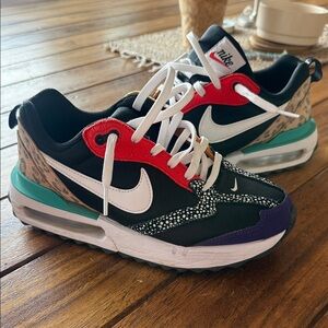 Nike womens Black and Red cheetah Sneakers